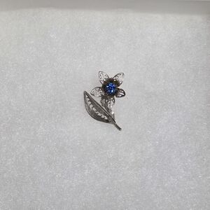 Vintage Silver Floral Brooch with Blue Rhinestone Center
